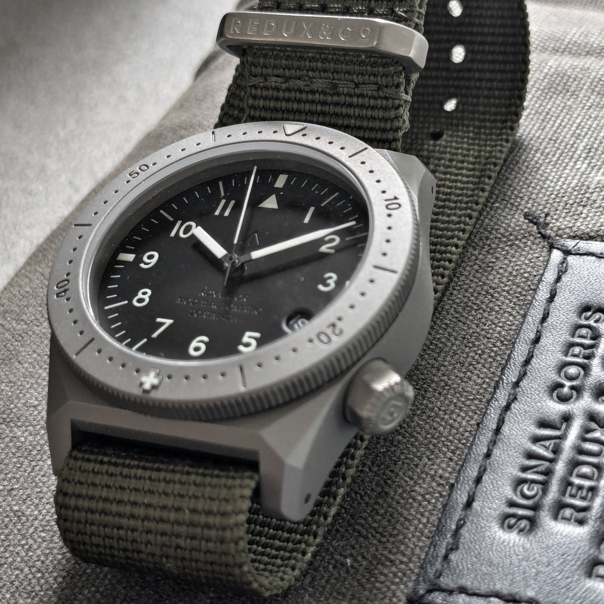 VALOR Model 11 titanium automatic watch with a high-legibility black dial.