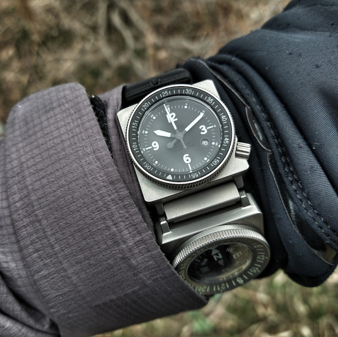 SCOUT A-9 Automatic and compass instruments worn outdoors with the production solid-white A-9 bezel triangle.