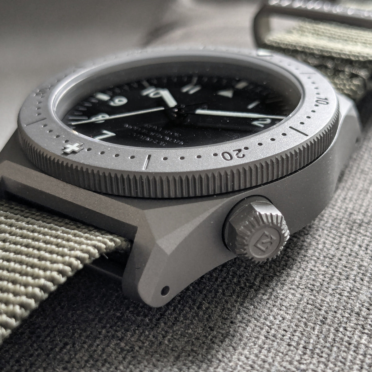 VALOR Model 11 Grade 5 titanium case and dial detail.