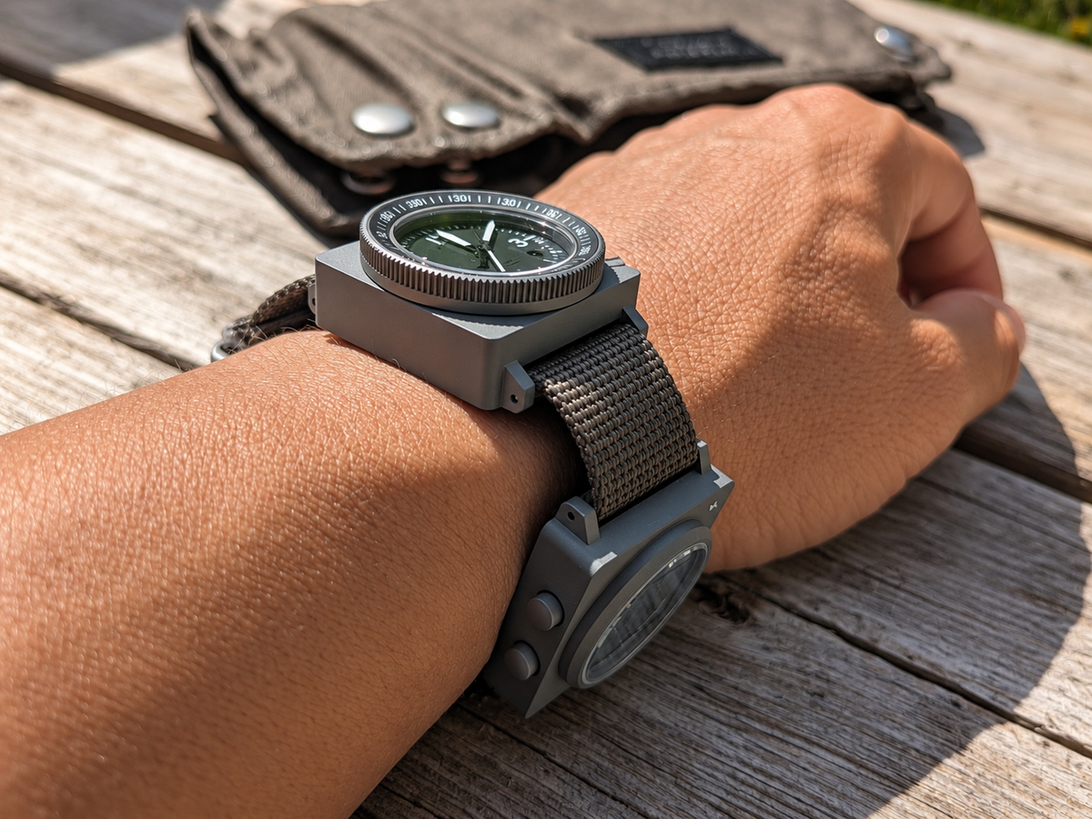 Two SCOUT modules worn offset from each other along one strap.