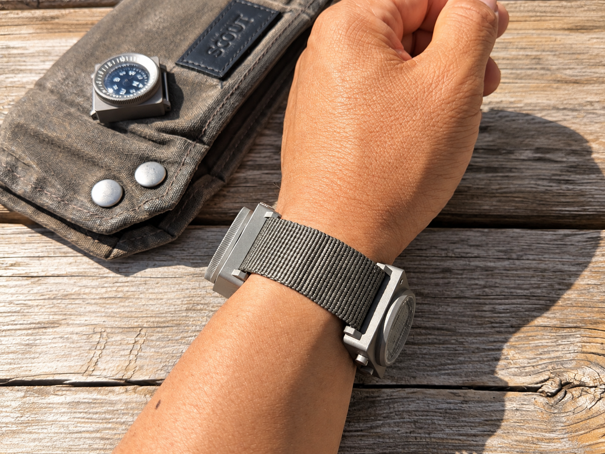 Two SCOUT modules worn on opposite sides of the wrist on one strap.
